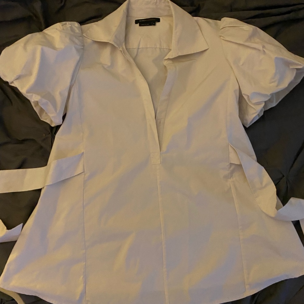 Material is a light taffeta it holds a nice shape